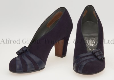 Cover shot showing a pair of women's navy suede/leather slip-on shoes; Clarks Skyline 'Revere', 1948 ©Alfred Gillett Trust / C & J Clark Ltd